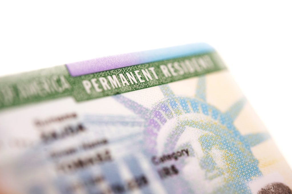 stock image of American green card (U.S. permanent resident)